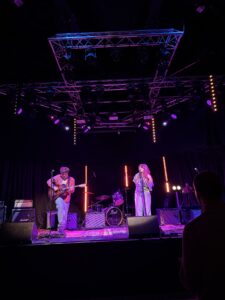 Photo of Alex Lyons performing at Soundcheck, ARC, Stockton in May 2026, supporting George Bailey Band, reviewed by Joanna Long of Echoes In Ink